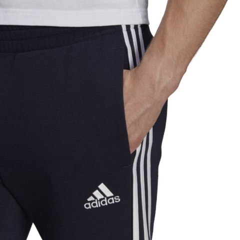 Spodnie adidas Essentials Tapered Cuff 3 Stripes M GK8977 S Spodnie adidas Essentials Tapered Cuff 3 Stripes M GK8977 S
