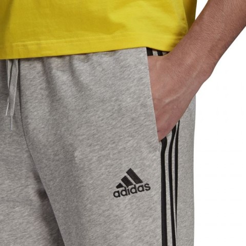 Spodnie adidas Essentials Tapered Cuff 3 Stripes M GK8889 XL Spodnie adidas Essentials Tapered Cuff 3 Stripes M GK8889 XL