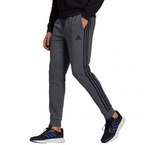 Spodnie adidas Essentials Tapered Cuff 3 Stripes M GK8826 2XL Spodnie adidas Essentials Tapered Cuff 3 Stripes M GK8826 2XL